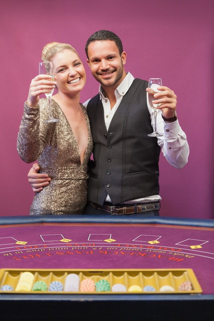koitot app running on both Android phone and iPad showing live roulette table with HD multi-camera stream