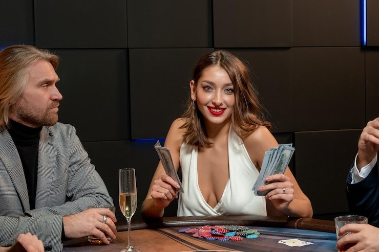 Player betting on Buffalo King live-dealer table on mobile phone with live chat visible